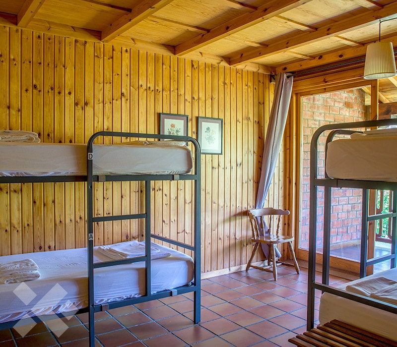 Fin de curso Multiaventura en Cantabria: Habitación Albergue La Cabaña